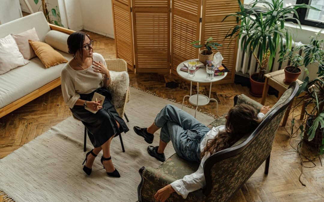 Visa consultant advising a client in a cozy, modern office setting.