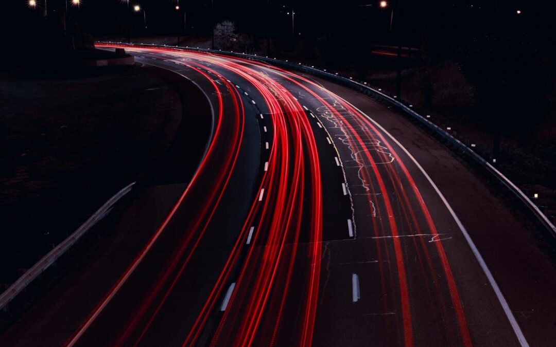 Light trails on highway symbolizing Canada's fast-track Express Entry immigration process.