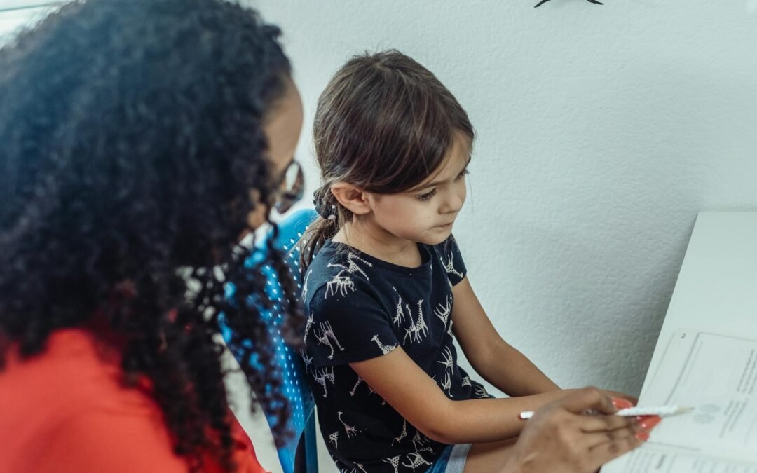 French tutor helping a child with lessons in Surrey, fostering language learning.