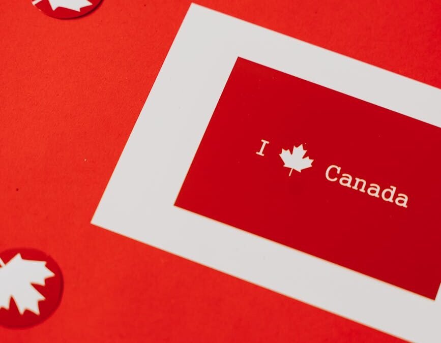Red Canadian-themed design featuring "I Canada" text and maple leaf motifs.
