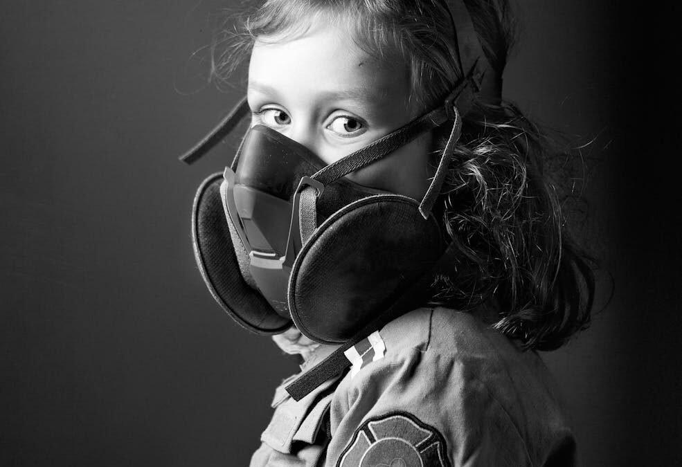 Child in protective gear, symbolizing the safety of protected persons in Canada.