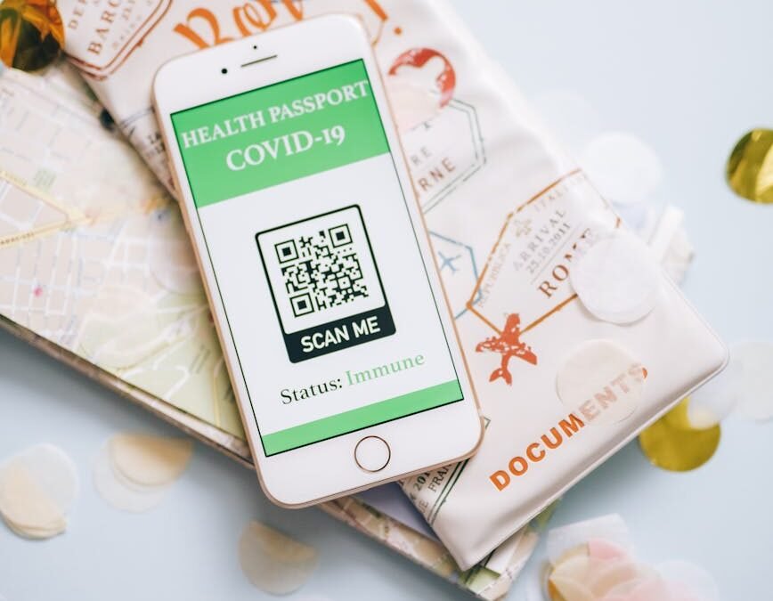 Mobile health passport showcasing COVID-19 status, symbolizing the renewal of protected status.