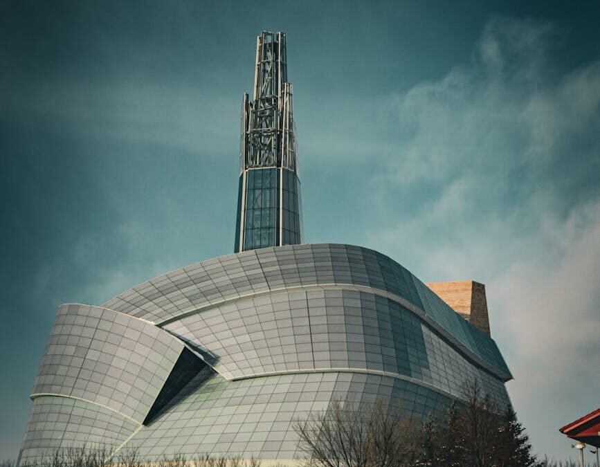 Winnipeg skyline featuring modern architecture, relevant for work permit discussions.