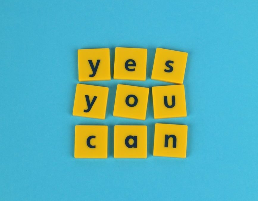 Encouraging message for logistics contest: 'Yes You Can' on vibrant blue background.