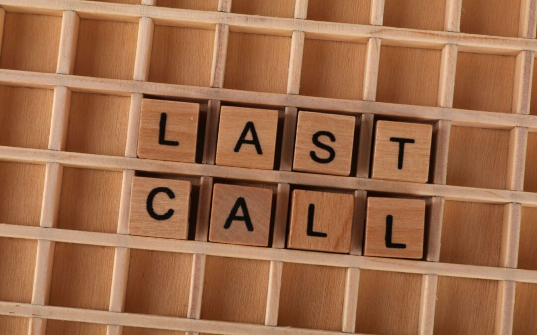 Wooden blocks spelling 'Last Call' for IEC Season Closing announcement.